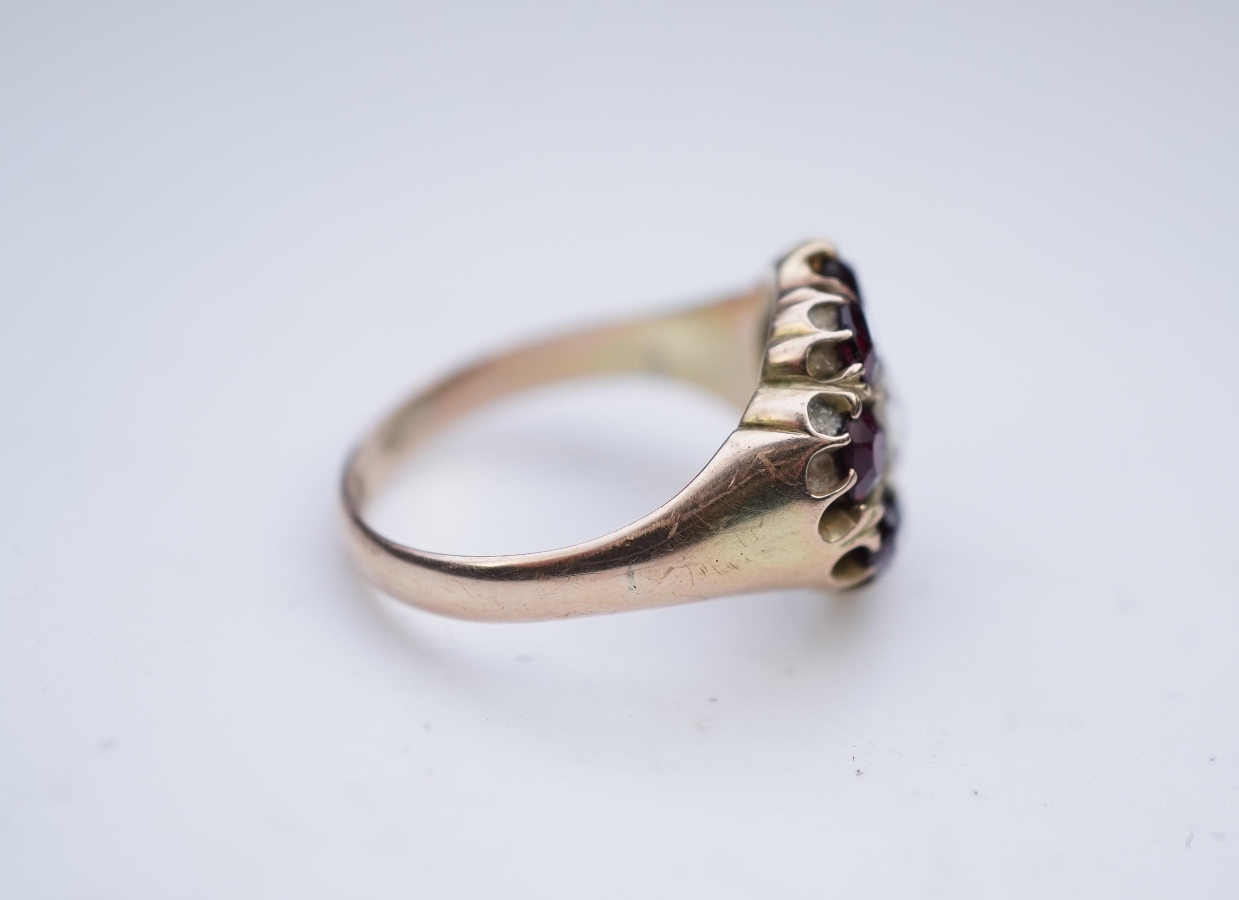 A garnet and diamond ring, late 19th century